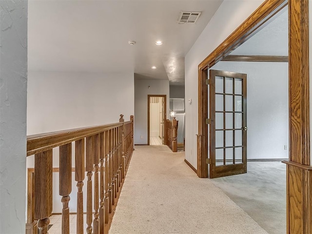 3601 Rena Dawn Ln, Edmond, OK 73013 - hallway featuring visible vents, baseboards, recessed lighting, carpet, and an upstairs landing