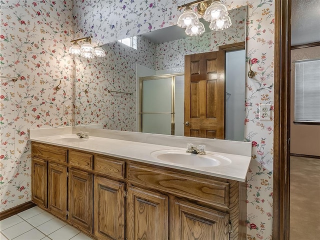 3601 Rena Dawn Ln, Edmond, OK 73013 - full bathroom with a sink, a stall shower, and wallpapered walls
