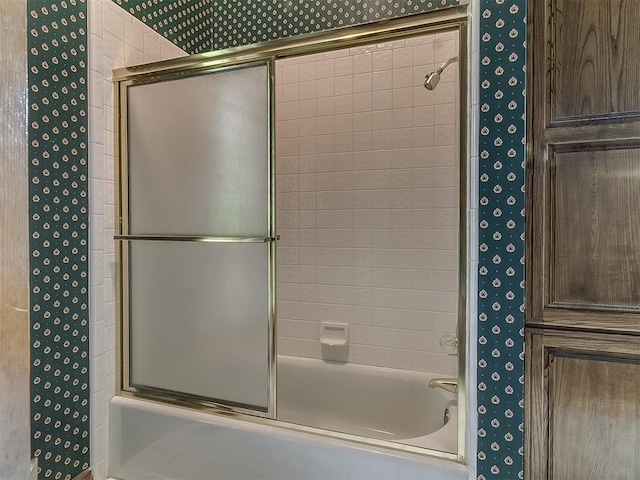 3601 Rena Dawn Ln, Edmond, OK 73013 - bathroom with combined bath / shower with glass door and wallpapered walls