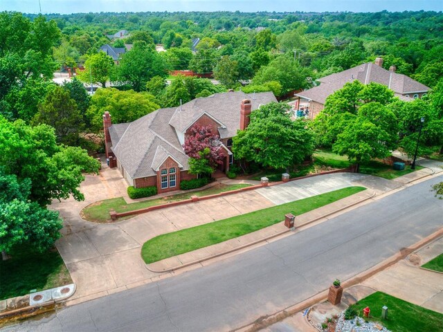 3601 Rena Dawn Ln, Edmond, OK 73013 - drone / aerial view featuring a forest view