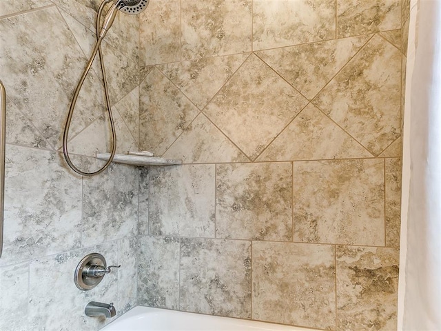 interior details with bathing tub / shower combination