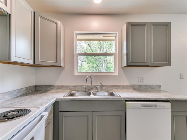 1823 E Rutgers Ave, Guthrie, OK 73044 - kitchen with white appliances, a sink, gray cabinets, and light countertops