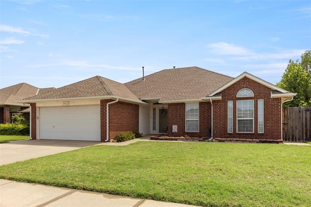 ranch-style house with driveway, brick siding, fence, a garage, and a front lawn