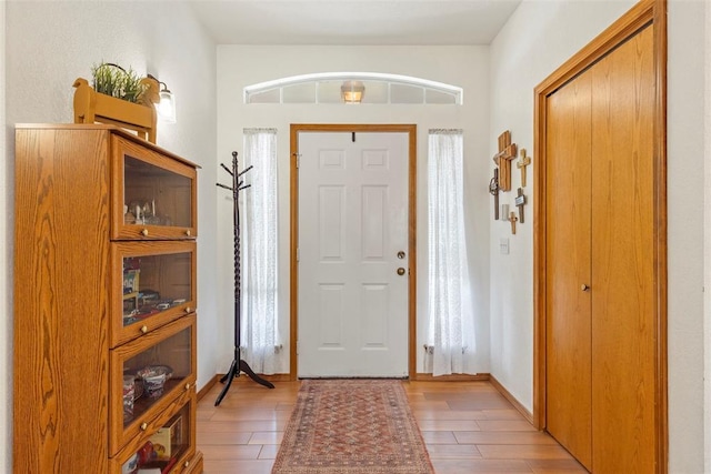 foyer featuring light wood-style floors