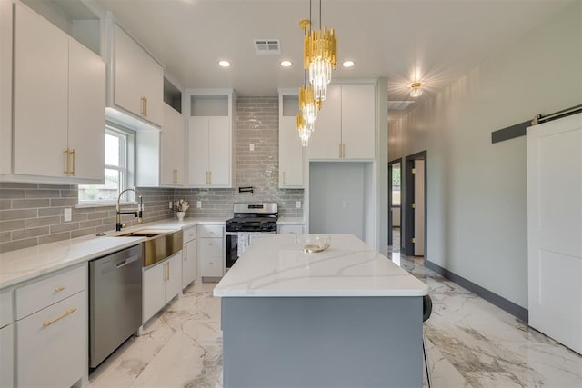 kitchen featuring a sink, marble finish floor, visible vents, and appliances with stainless steel finishes