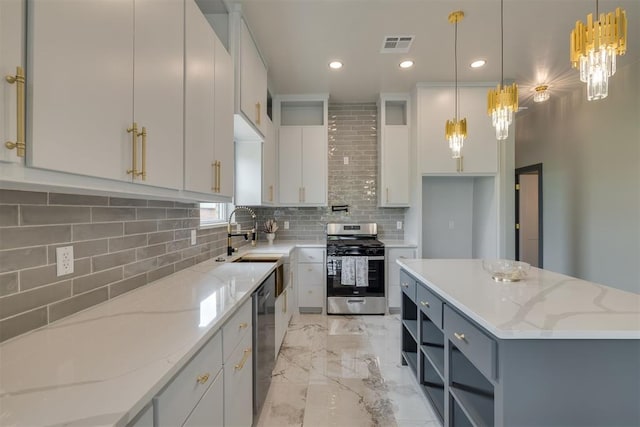 kitchen featuring stainless steel range with gas cooktop, tasteful backsplash, a sink, visible vents, and dishwasher
