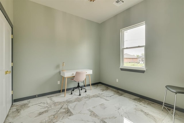 office featuring baseboards, visible vents, and marble finish floor