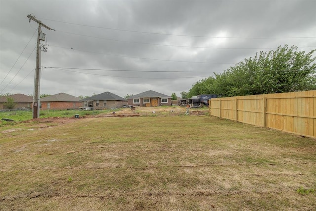 view of yard featuring fence