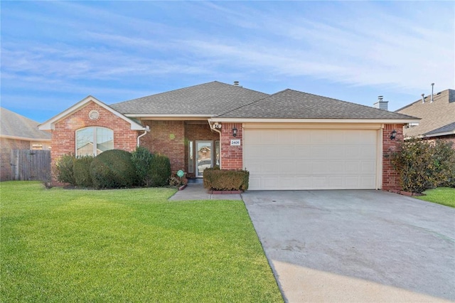 2405 Chadsford Ln, Yukon, OK 73099 - view of front of home with concrete driveway, brick siding, a garage, and a shingled roof