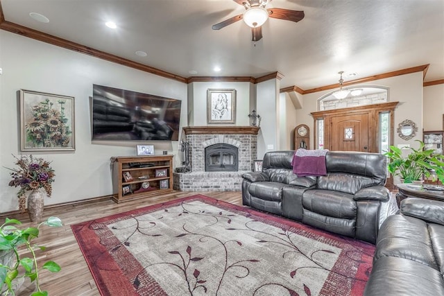 1400 S May Ave, Guthrie, OK 73044 - living area with a ceiling fan, crown molding, wood finished floors, and a fireplace