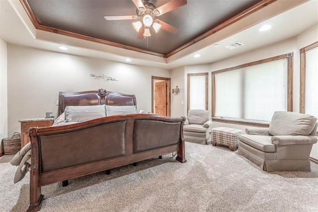 1400 S May Ave, Guthrie, OK 73044 - carpeted bedroom with a raised ceiling, recessed lighting, ornamental molding, and a ceiling fan