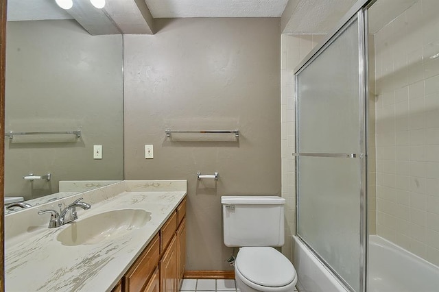 full bath featuring shower / bath combination with glass door, toilet, and vanity