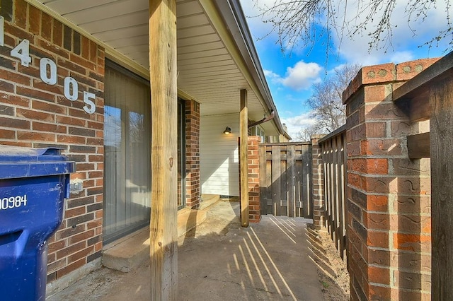 exterior space with brick siding