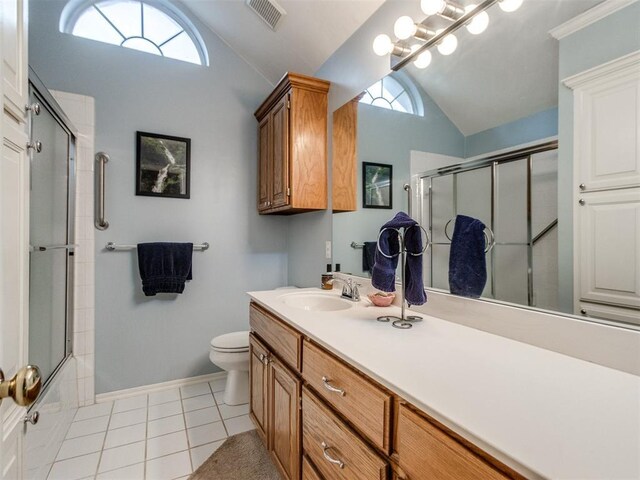 bathroom with visible vents, a shower with door, toilet, tile patterned floors, and vaulted ceiling