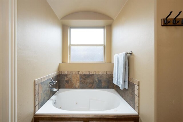 full bathroom with a bath