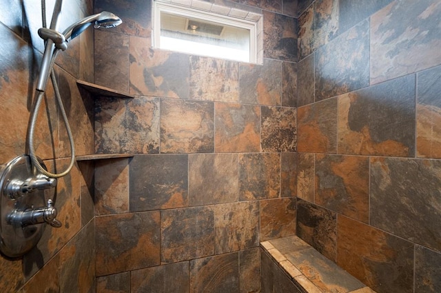 room details with a tile shower