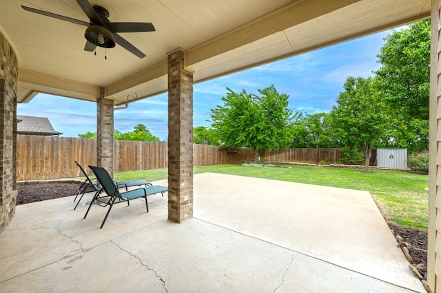 view of patio featuring ceiling fan and a fenced backyard