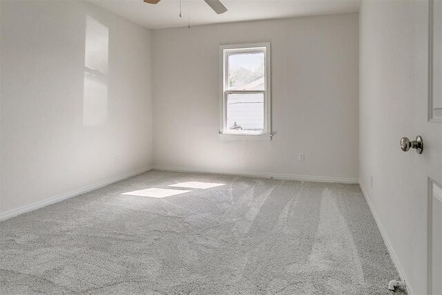 941 SW 48th St, Oklahoma City, OK 73109 - unfurnished room featuring carpet floors, a ceiling fan, and baseboards