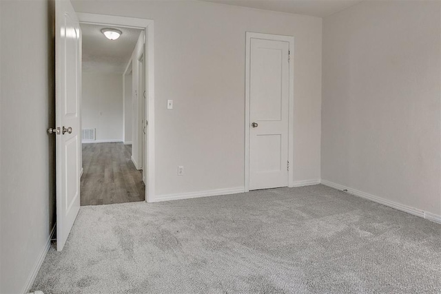 941 SW 48th St, Oklahoma City, OK 73109 - unfurnished bedroom with carpet flooring and baseboards