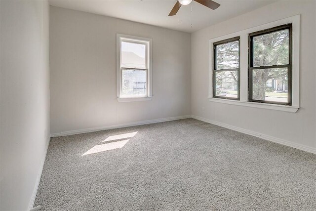 941 SW 48th St, Oklahoma City, OK 73109 - empty room featuring healthy amount of natural light, ceiling fan, and carpet