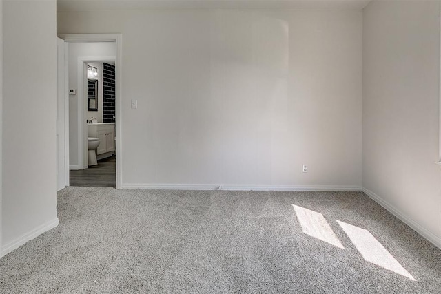 941 SW 48th St, Oklahoma City, OK 73109 - carpeted spare room featuring baseboards