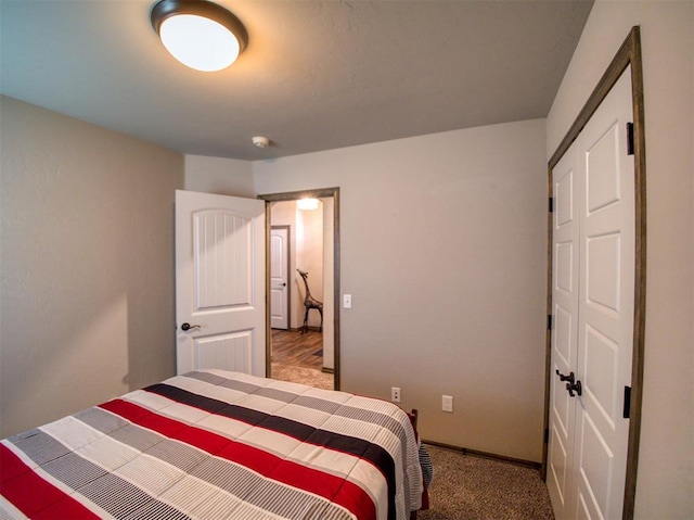 2216 Wheatheart Dr, Yukon, OK 73099 - bedroom featuring carpet flooring and baseboards