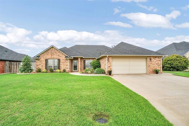 single story home with concrete driveway, brick siding, a front yard, and a garage