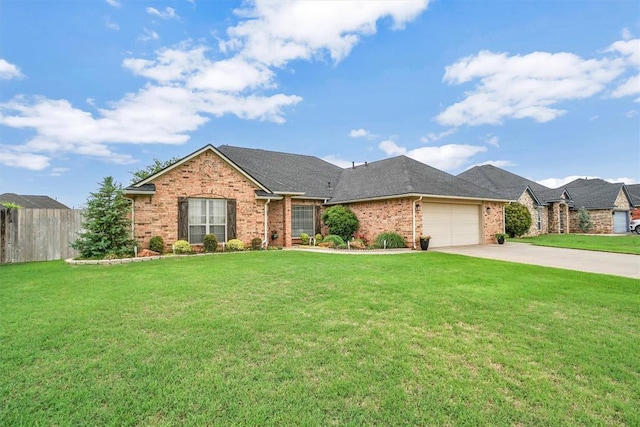 single story home with fence, an attached garage, a front lawn, brick siding, and concrete driveway