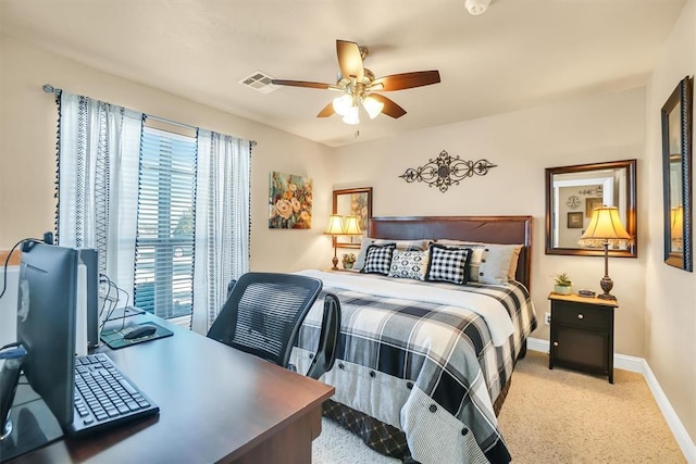carpeted bedroom featuring baseboards, visible vents, and ceiling fan