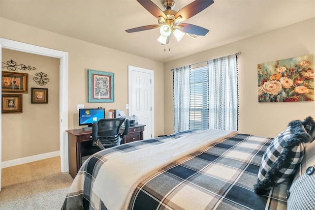 bedroom with baseboards and ceiling fan