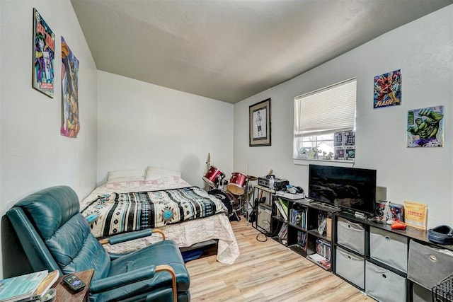 bedroom with wood finished floors