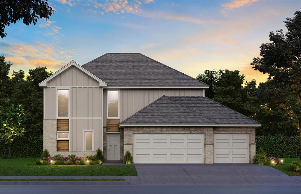 traditional home with brick siding, a shingled roof, driveway, and an attached garage