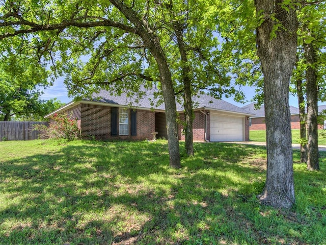 11853 Ridge Pt, Guthrie, OK 73044 - ranch-style home with brick siding and a garage