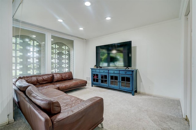 carpeted living area featuring crown molding, baseboards, recessed lighting, and a healthy amount of sunlight