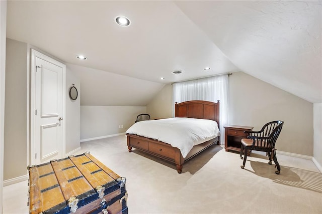 1119 Glenwood Ave, Nichols Hills, OK 73116 - bedroom featuring lofted ceiling, light colored carpet, and baseboards