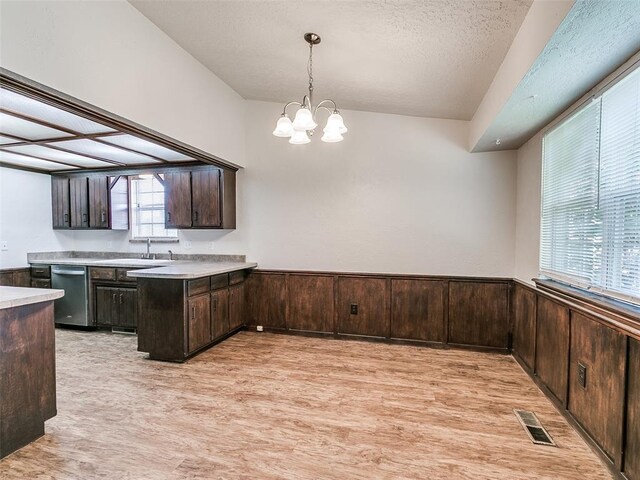 1357 W Cedarbrook Ln, Moore, OK 73170 - kitchen with an inviting chandelier, light wood-style flooring, dark brown cabinets, dishwasher, and visible vents