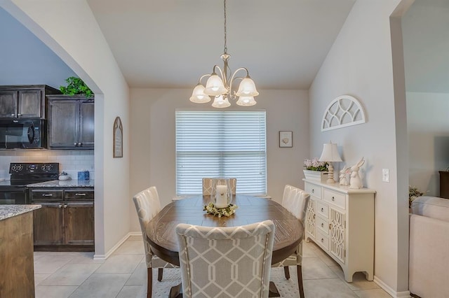 dining area featuring an inviting chandelier, baseboards, and light tile patterned floors