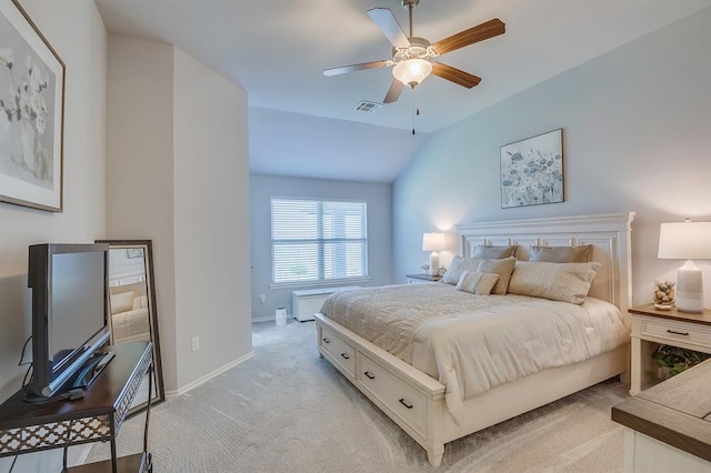 bedroom featuring visible vents, light carpet, baseboards, ceiling fan, and vaulted ceiling
