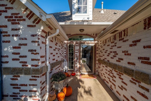view of home's exterior featuring roof with shingles