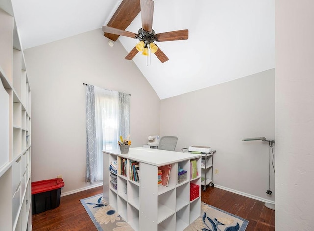 office space featuring vaulted ceiling with beams, baseboards, ceiling fan, and wood finished floors