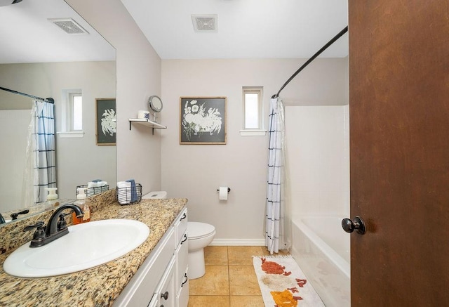 bathroom featuring visible vents, tile patterned floors, a healthy amount of sunlight, and vanity