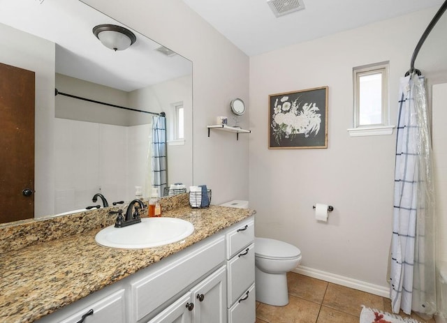 bathroom with toilet, visible vents, curtained shower, and vanity
