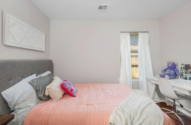 bedroom with visible vents
