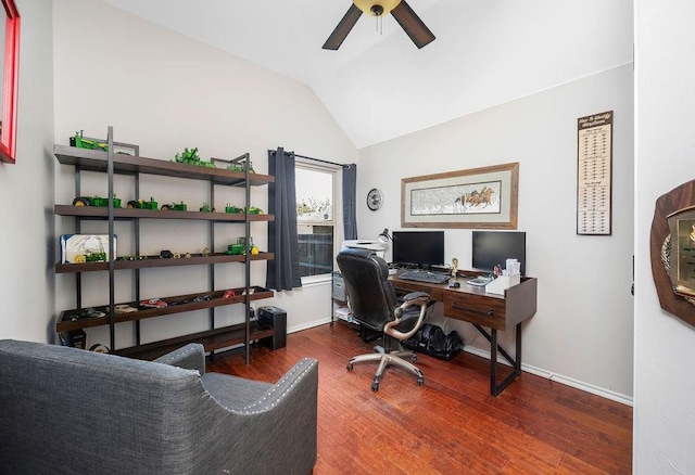 office space with baseboards, a ceiling fan, wood finished floors, and lofted ceiling