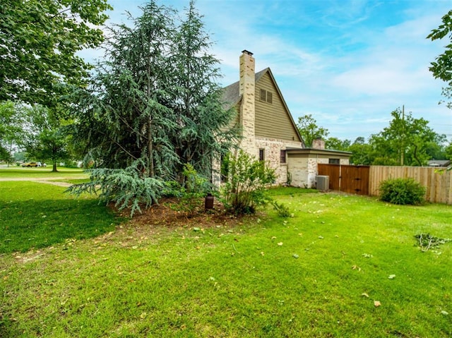1818 N Union Ave, Shawnee, OK 74804 - view of yard with central AC unit