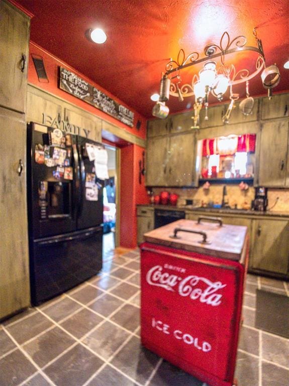 1818 N Union Ave, Shawnee, OK 74804 - kitchen with black fridge with ice dispenser and recessed lighting