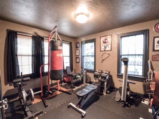 1818 N Union Ave, Shawnee, OK 74804 - exercise area with a textured ceiling and plenty of natural light
