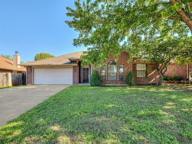 1621 Park View Pl, Edmond, OK 73003 - ranch-style home featuring a garage, fence, a front lawn, and brick siding