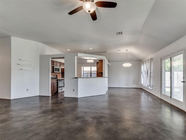 1621 Park View Pl, Edmond, OK 73003 - unfurnished living room with ceiling fan, finished concrete floors, a textured ceiling, visible vents, and baseboards