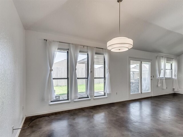 1621 Park View Pl, Edmond, OK 73003 - unfurnished dining area featuring baseboards and finished concrete floors